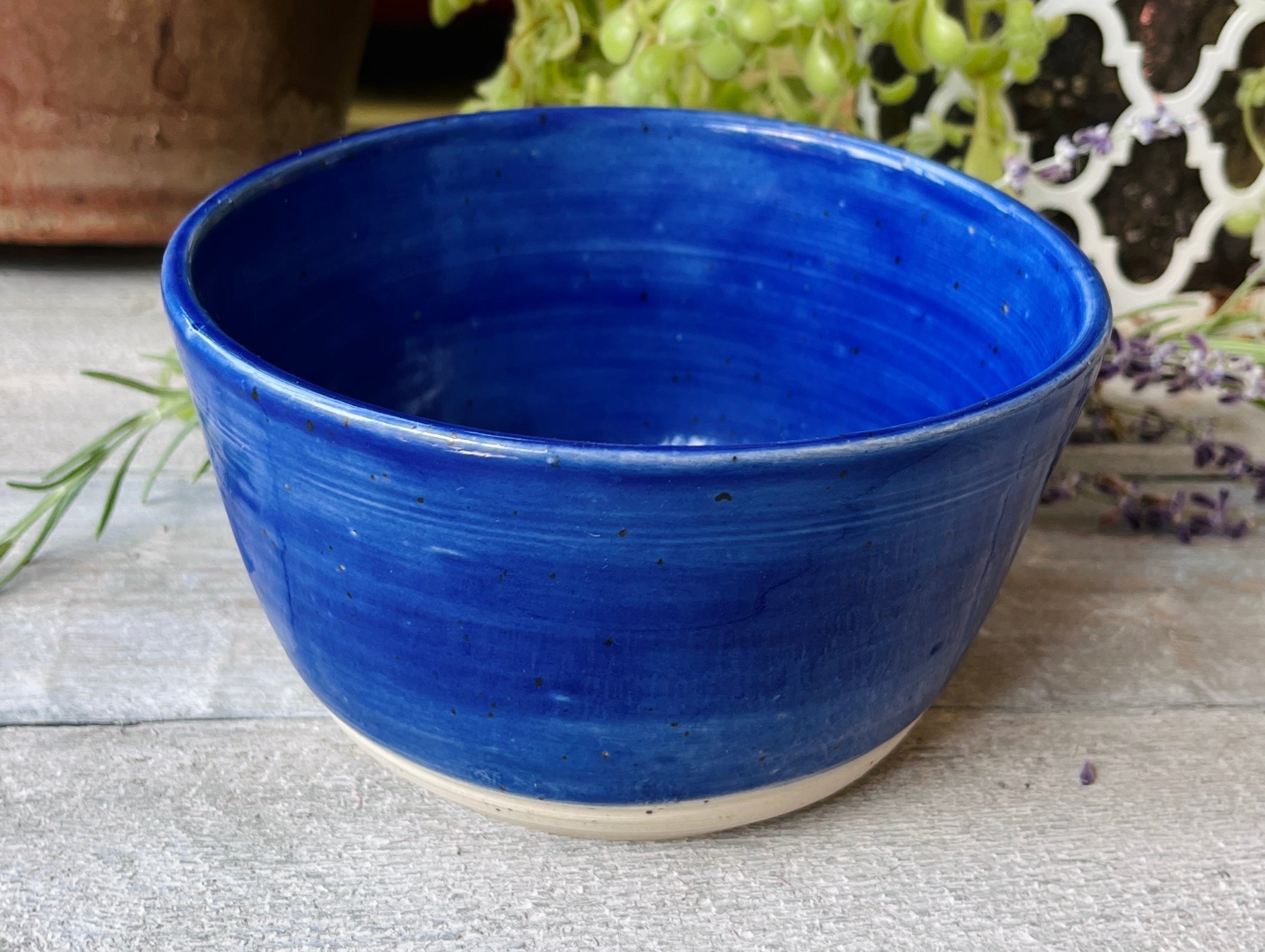 Handmade ceramic bowl with deep solid cobalt blue glaze